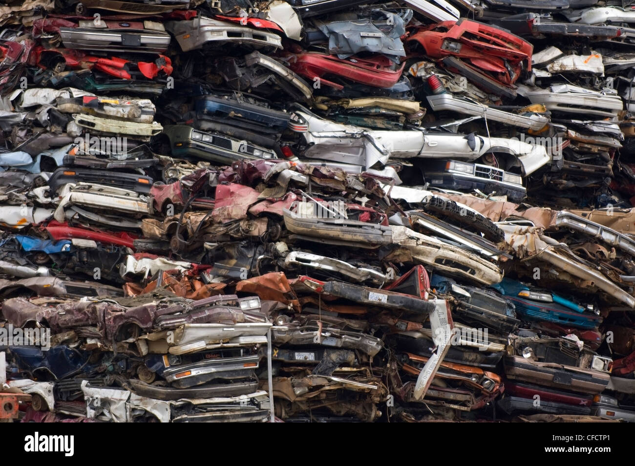 Stacks of obsolete cars in recycling yard, Vancouver Island, British Columbia, Canada Stock Photo
