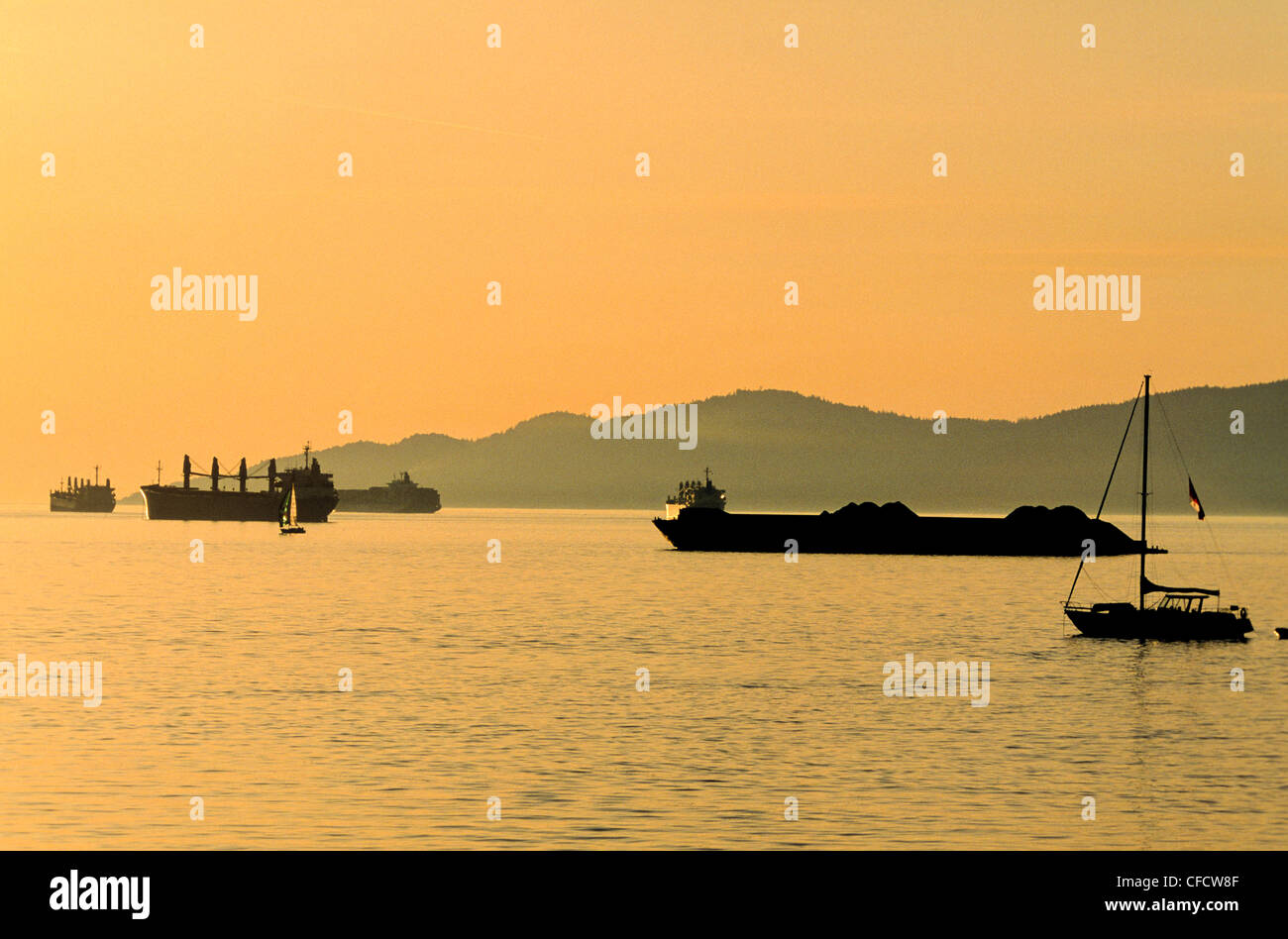 Ships in sunset, English Bay, Vancouver, British Columbia, Canada Stock Photo