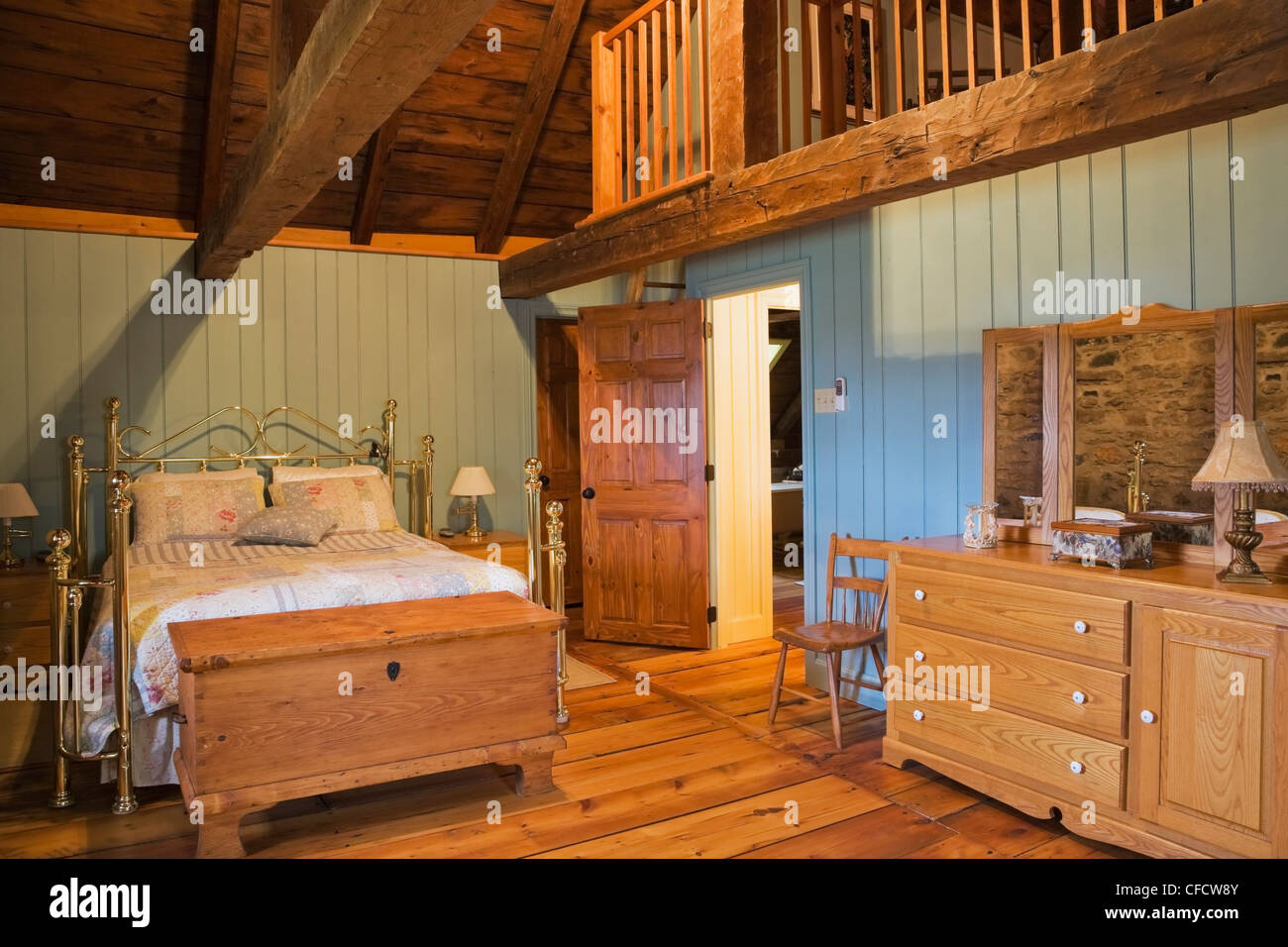 Brass bed furnishings master bedroom upstairs Stock Photo Alamy