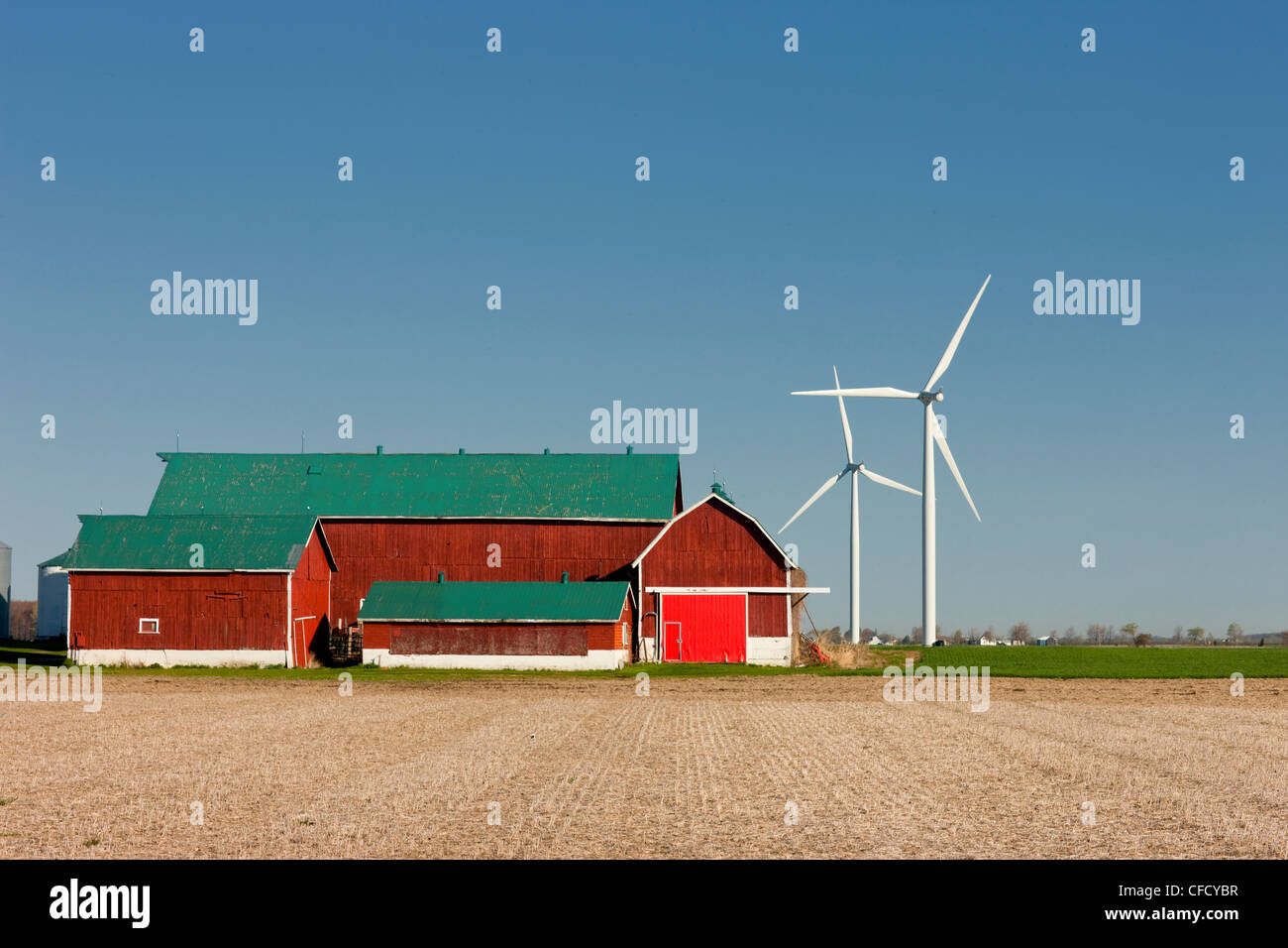 Wind turbines and barn, Talbot Trail, 3, Merlin, Ontario, Canada Stock Photo