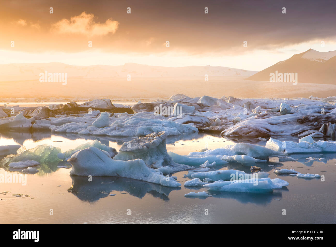 Icebergs,on the Jokulsarlon glacial lagoon at sunset, Iceland, Polar Regions Stock Photo
