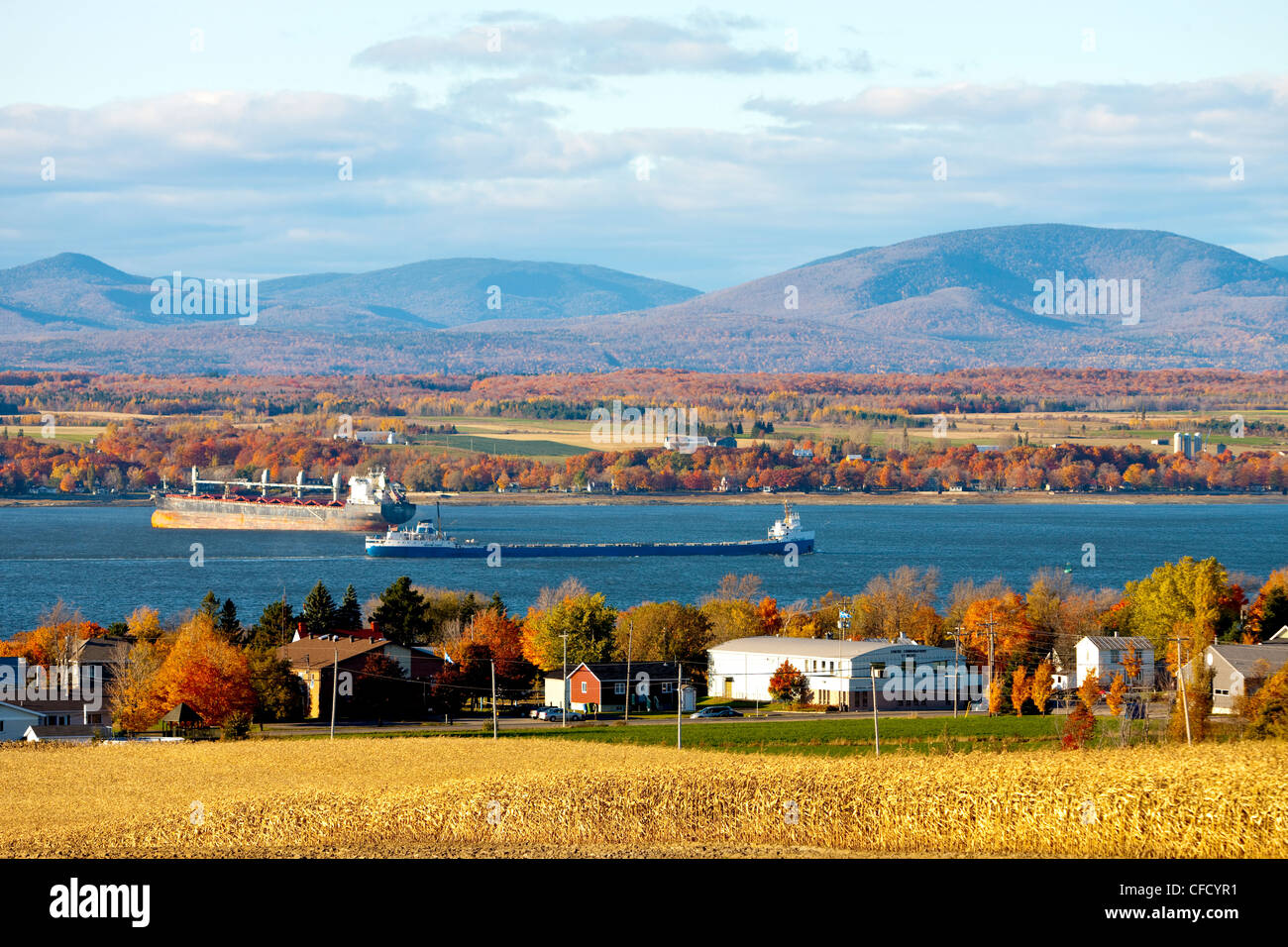 Ships travelling up the St. Lawrence River, SaintMicheldeBellechasse, Quebec, Canada Stock