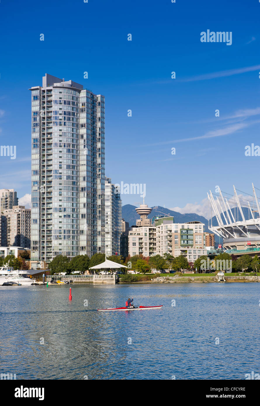 Kayaker, City skyline with new retractable roof on BC Place Stadium, False Creek, Vancouver, British Columbia, Canada Stock Photo