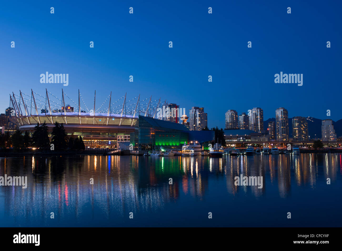 City skyline with new retractable roof on BC Place Stadium, False Creek ...