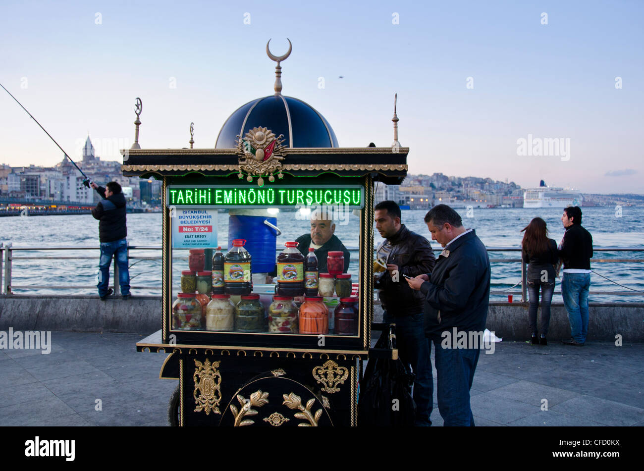 Food kiosk on the Golden Horn by the Galata Bridge, located in the Eminönü district of Istanbul, Turkey. Stock Photo