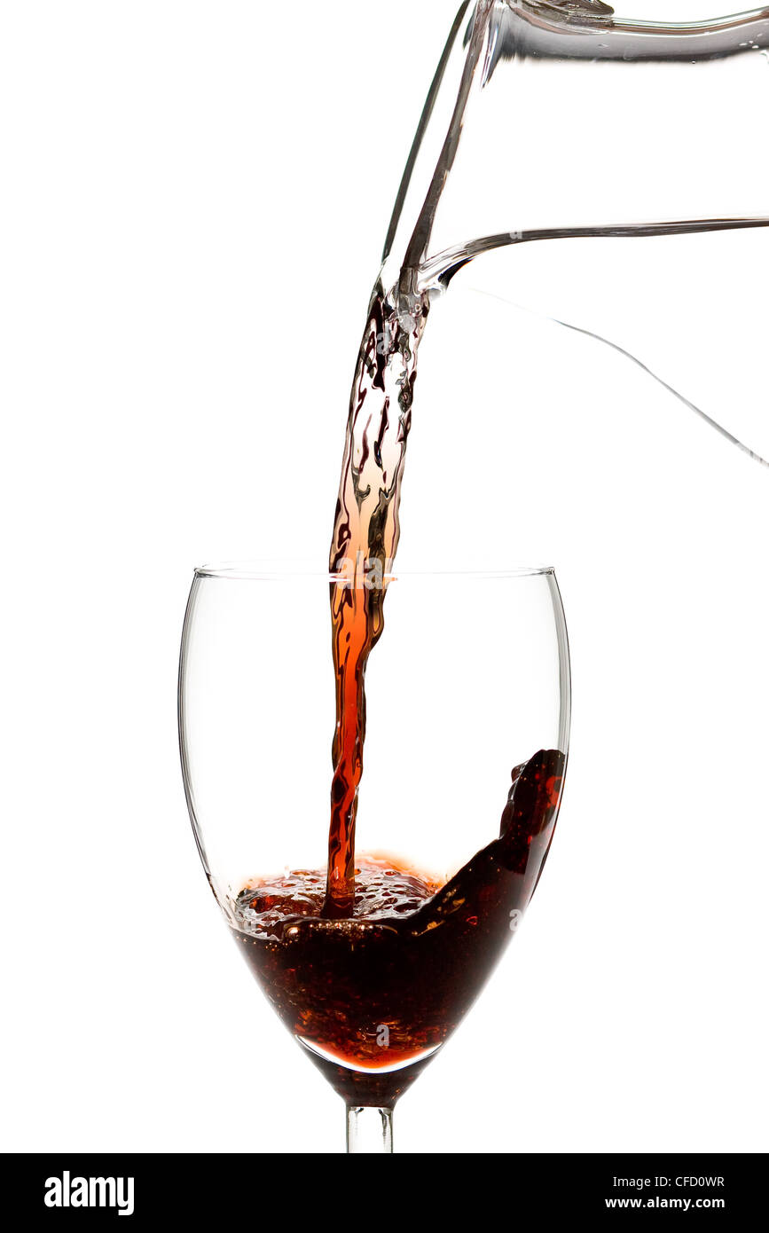 Water turns into wine concept isolated on white background Stock