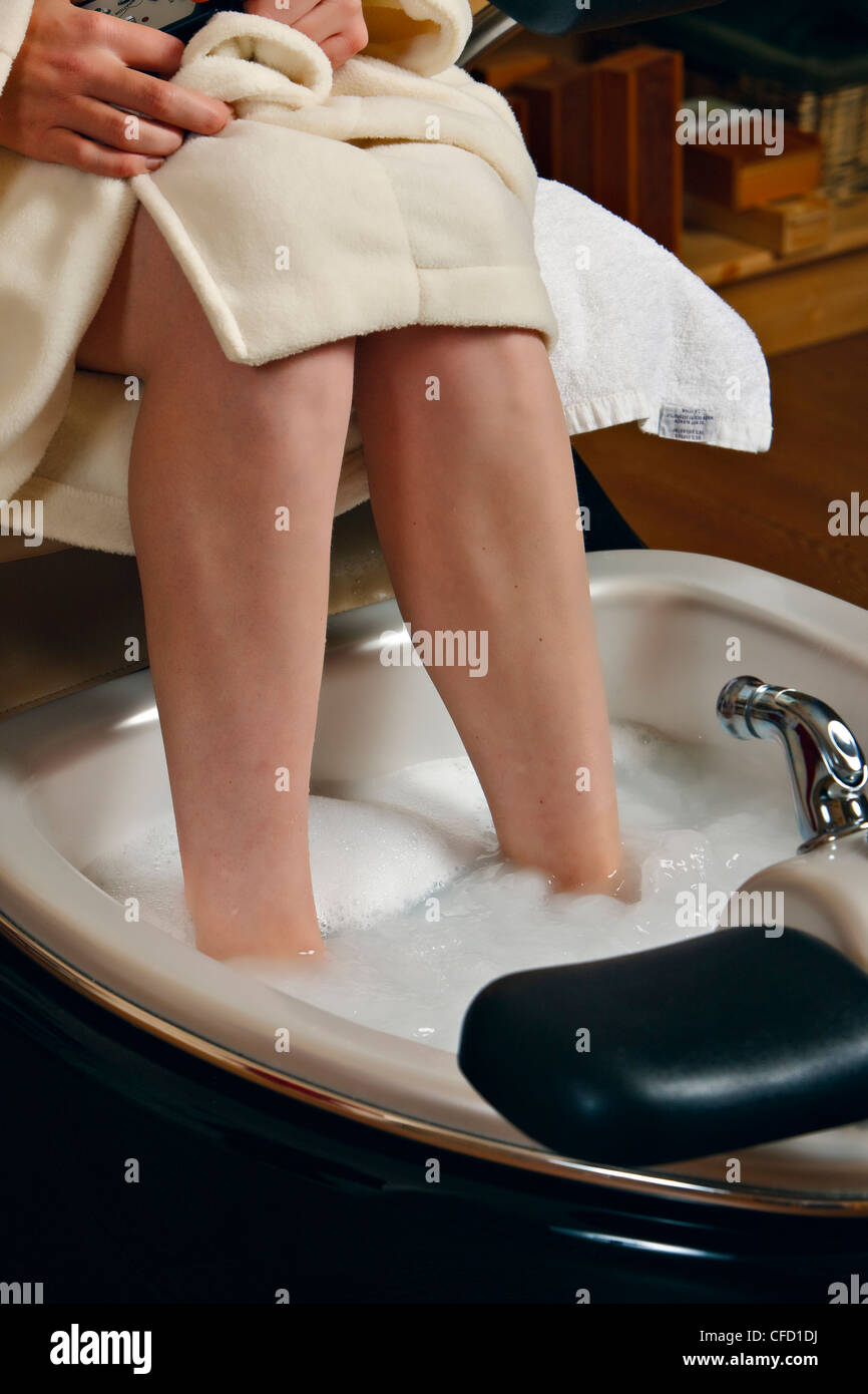 Woman soaking feet foot spduring pedicure Stock Photo Alamy
