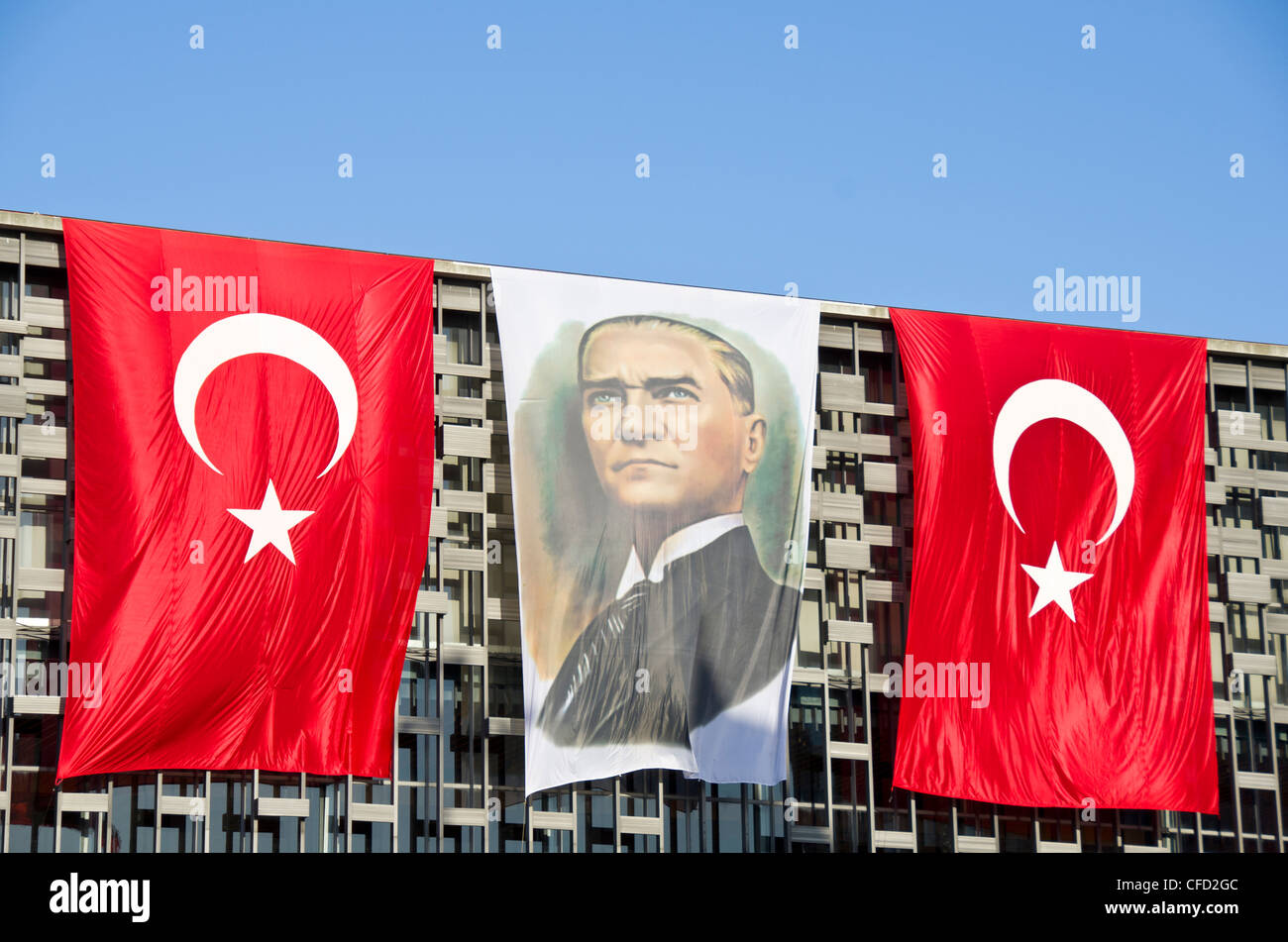 Portrait of Mustafa Kemal Atatürk and Turkish Flags on the Atatürk Cultural Center, Istanbul, Turkey Stock Photo