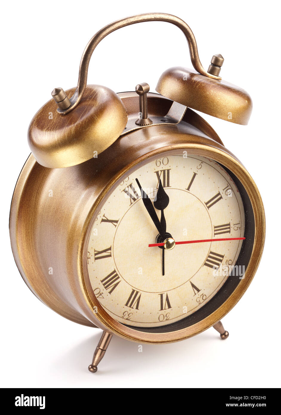 Alarm clock isolated on white background.It's five minutes to twelve p