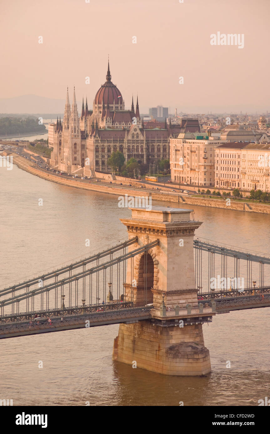 Panorama of city at sunset with neo-gothic Hungarian Parliament building, and the River Danube, Budapest, Hungary Stock Photo