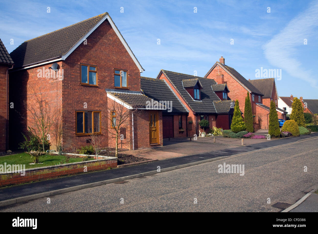 Modern suburban housing in new private estate, Martlesham Heath, Suffolk, England Stock Photo