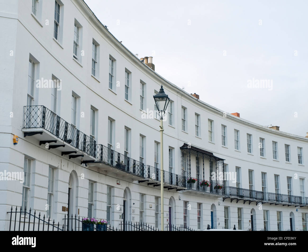 A section of the Regency architecture terraced houses which make up Royal Crescent, Cheltenham. Stock Photo