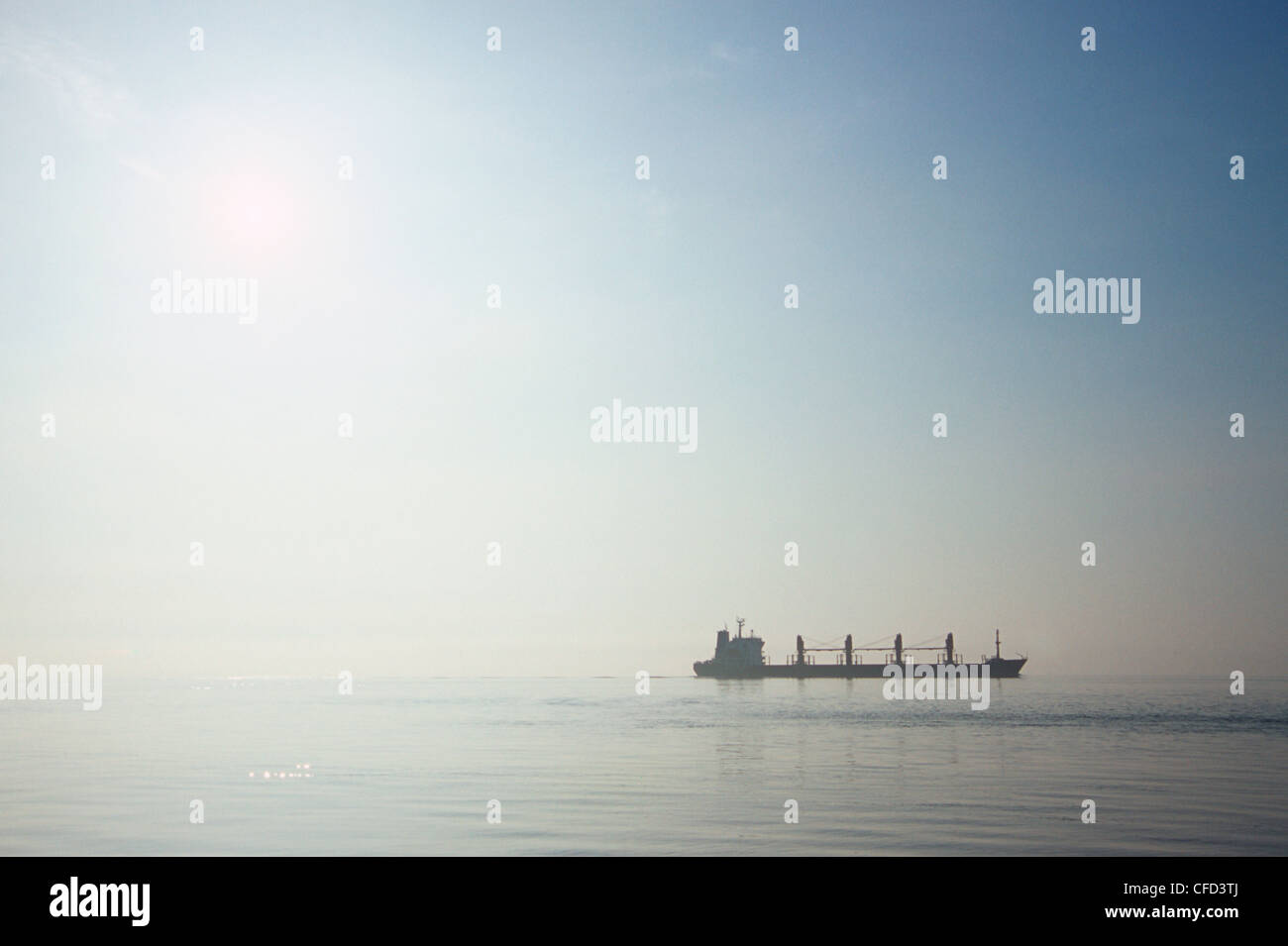 Cargo ship in morning mist, British Columbia, Canada Stock Photo - Alamy