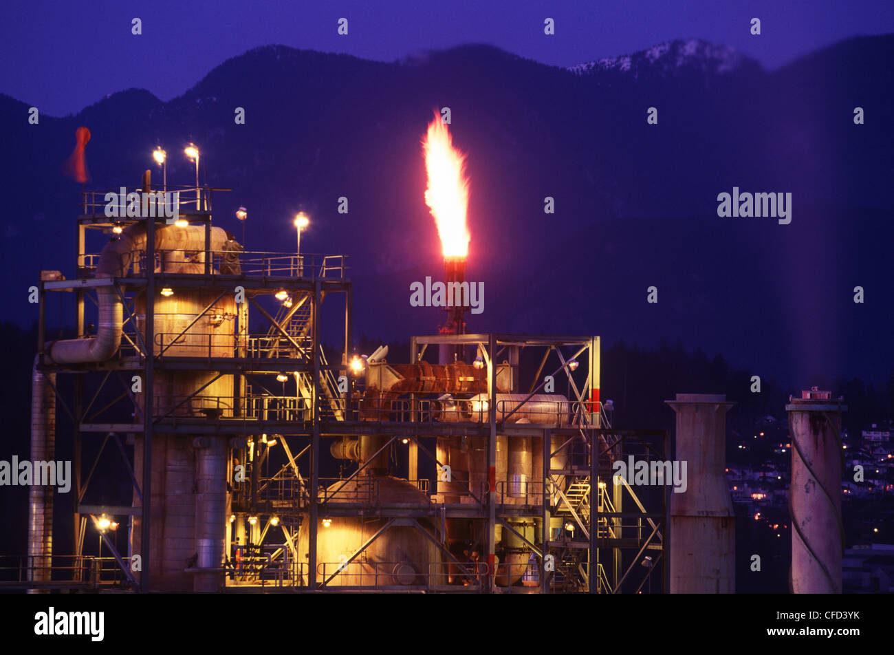 Oil refinery in Burnaby, North Shore mountains beyond, Vancouver