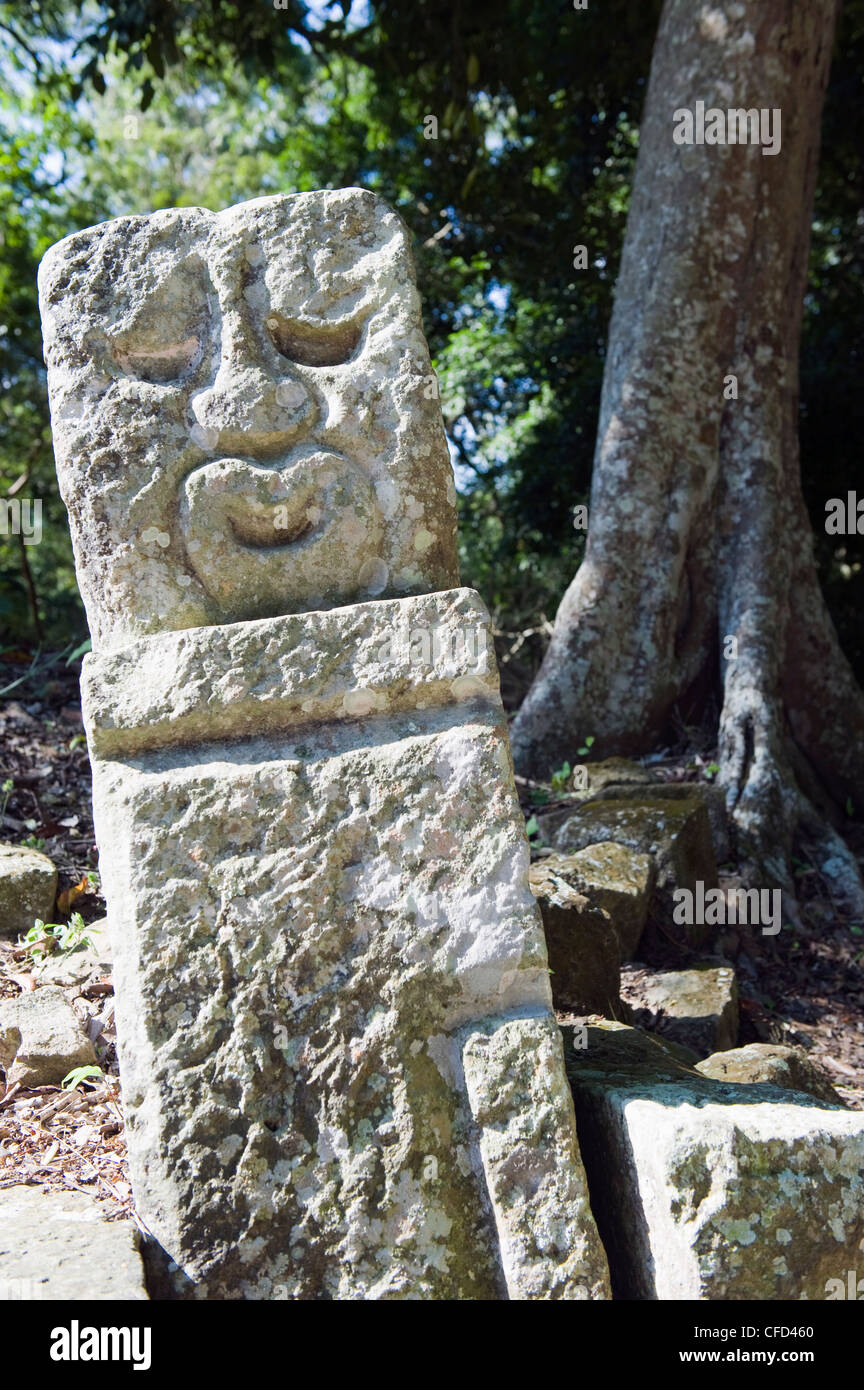 Sculpted head stone at Mayan archeological site, Copan Ruins, UNESCO
