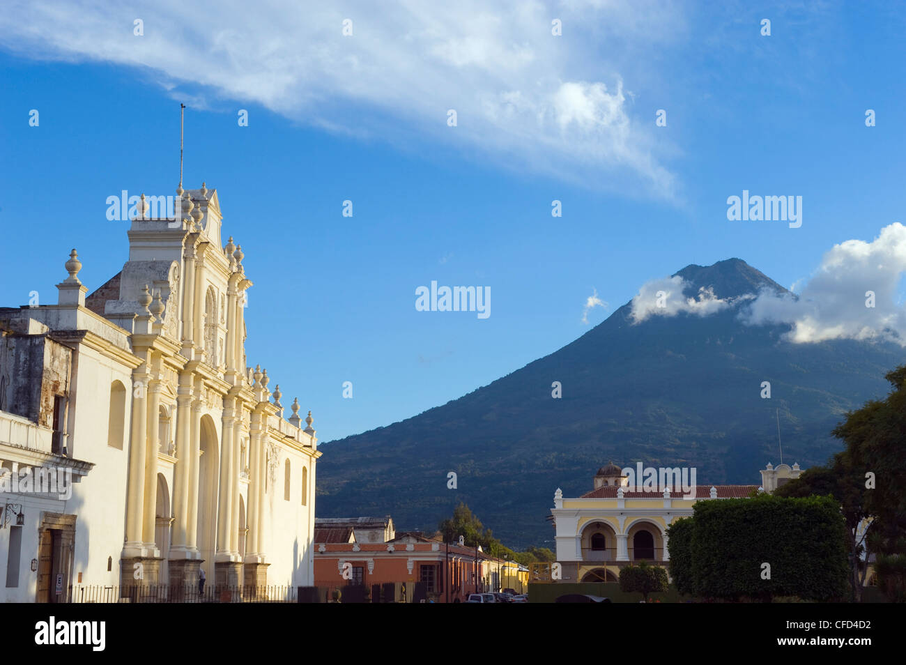 Volcan de Agua, 3765m, and Cathedral, Antigua, UNESCO World Heritage Site, Guatemala, Central America Stock Photo