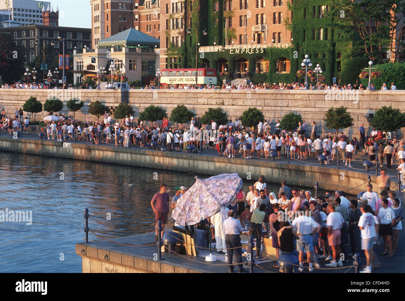 Inner Harbour causeway crowded with people, Victoria, Vancouver Island, British Columbia, Canada. Stock Photo