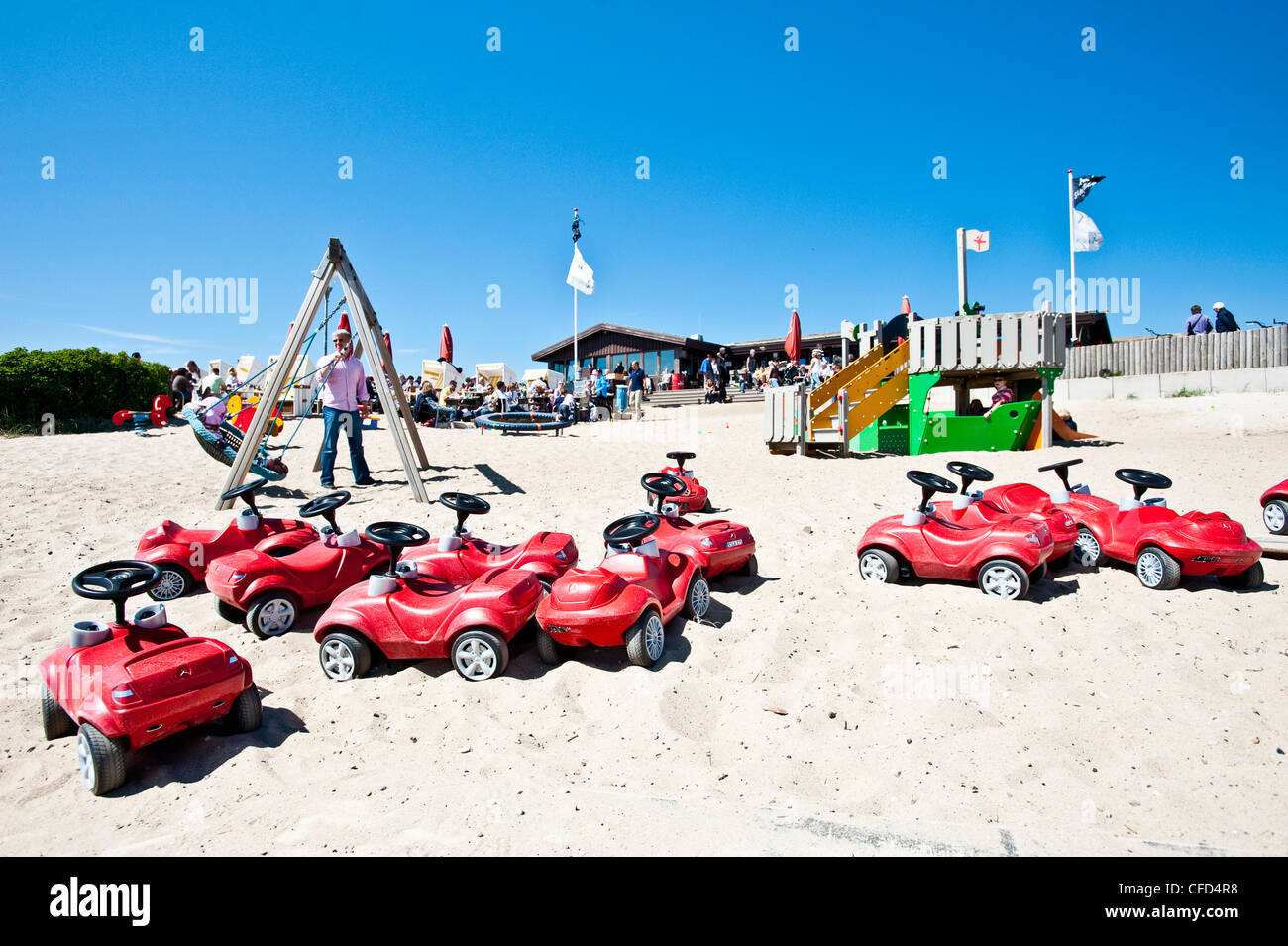 Bobby cars in front of restaurant Sansibar on the beach, Island of Sylt, Schleswig Holstein, Germany, Europe Stock Photo