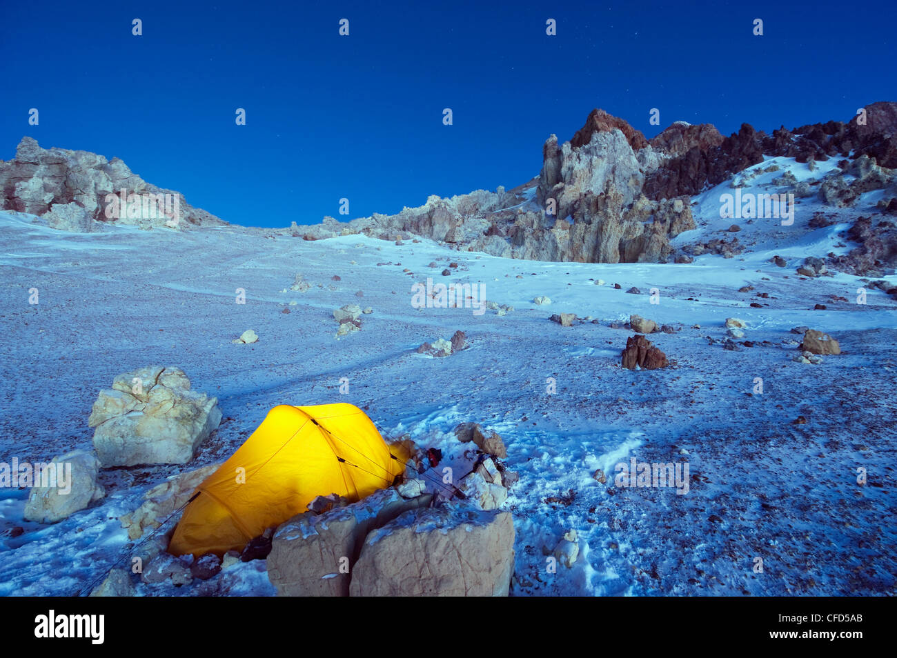 Illuminated tent at White Rocks campsite, Piedras Blancas, Aconcagua Provincial Park, Andes mountains, Argentina Stock Photo
