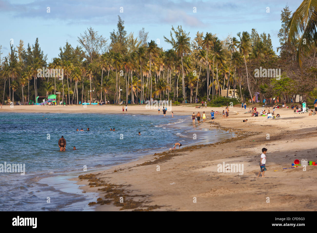 LUQUILLO, PUERTO RICO - People enjoying public beach. Stock Photo