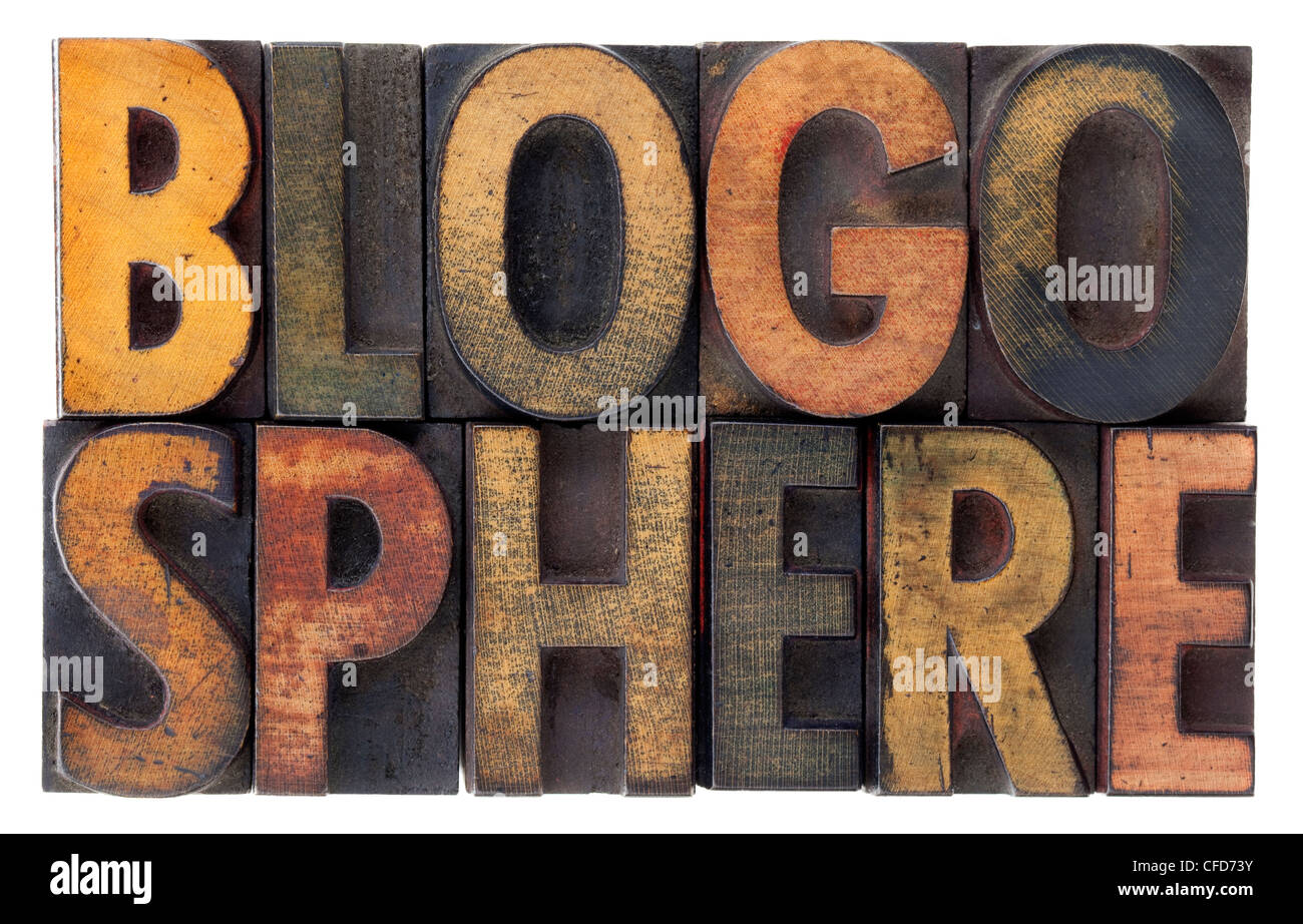 word blogosphere (global blog community) in vintage wood letterpress types, stained by ink, isolated on white Stock Photo