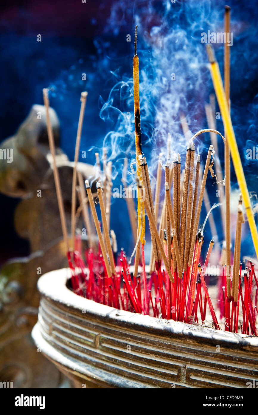 Incense burning at a Buddhist temple, Vietnam Stock Photo Alamy