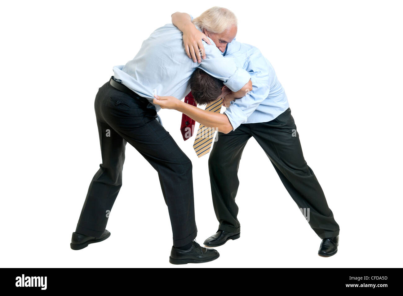 To businessmen wrestling isolated against a white background Stock Photo