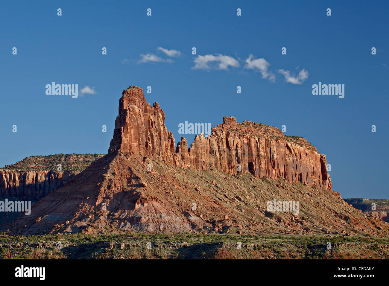 Red rock butte and a cloud, Canyon Country, Utah, United States of America, Stock Photo