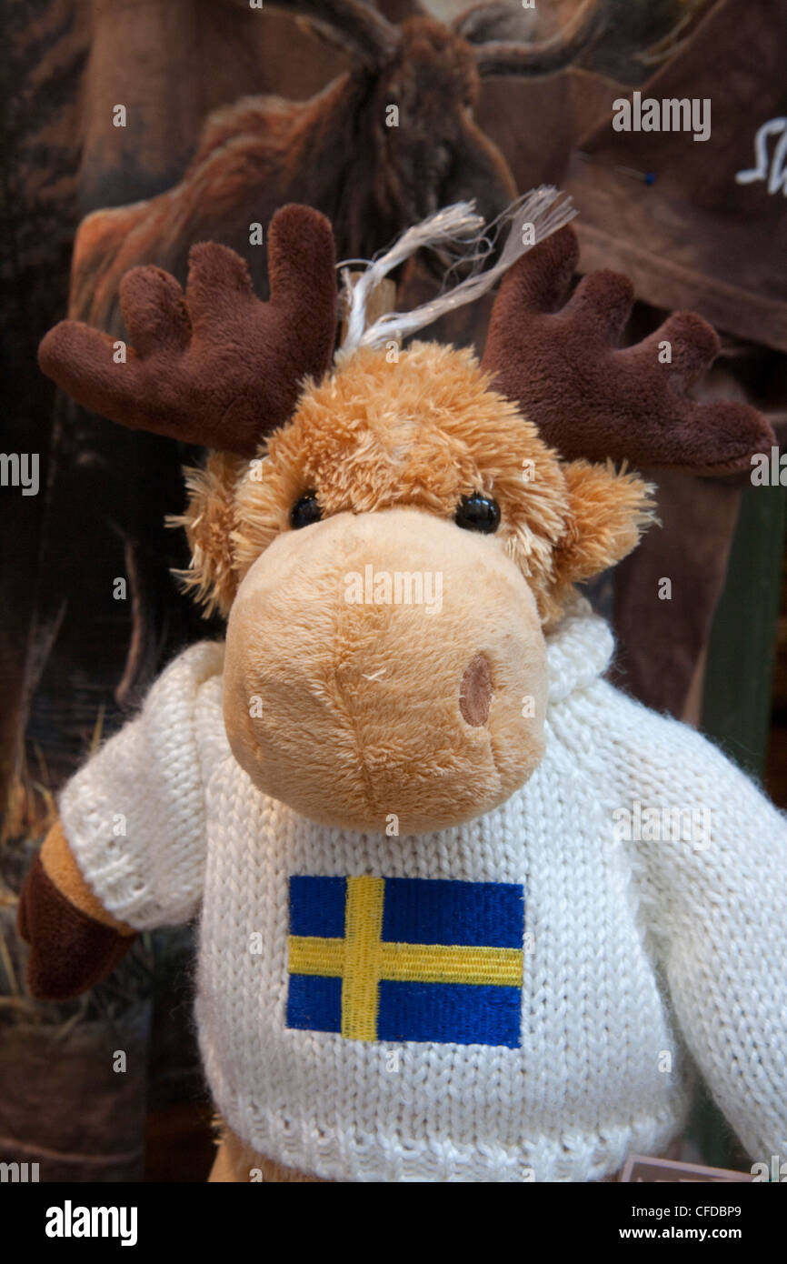 Souvenir cuddly toy moose wearing a pullover with Swedish flag, Stockholm, Stockholm, Sweden Stock Photo