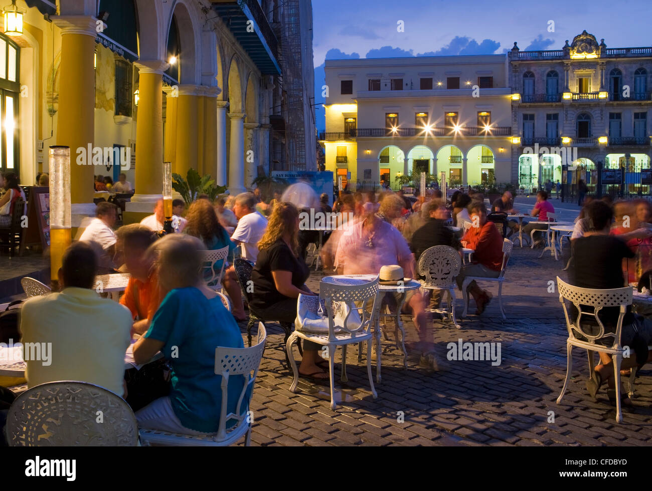 Eating al fresco in the evening, Plaza Vieja, Old Havana, Cuba, West Indies, Central America Stock Photo