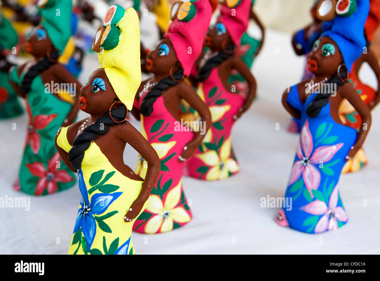 Souvenir traditional Cuban lady statues for sale in craft market in