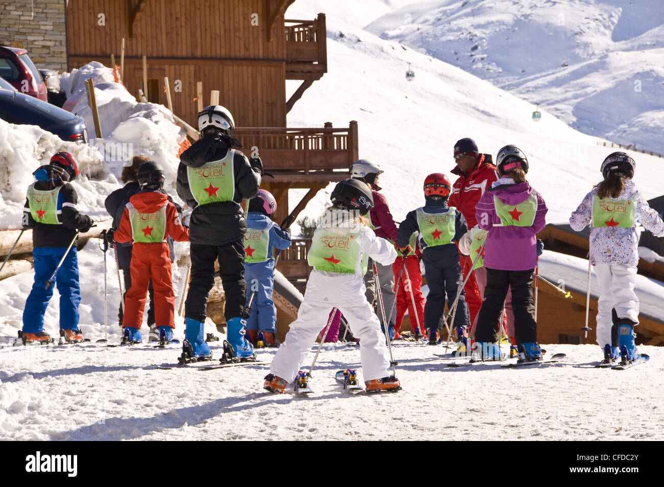 Group of children going for a ski lesson - Les Menuires (France) Stock Photo