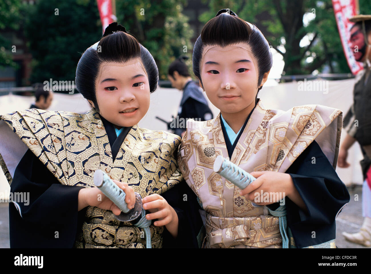 Japan, Honshu, Tokyo, Boys Dressed in Samurai Costume at Jidai Matsuri Festival at Sensoji Temple Asakusa Stock Photo
