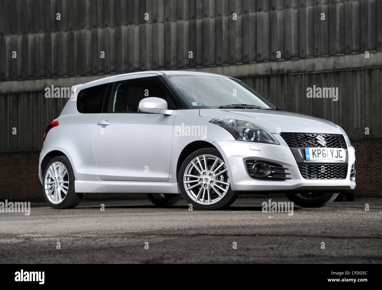 2012 model Suzuki Swift Sport hot hatch sports car front 3/4 three quarter view Stock Photo Alamy