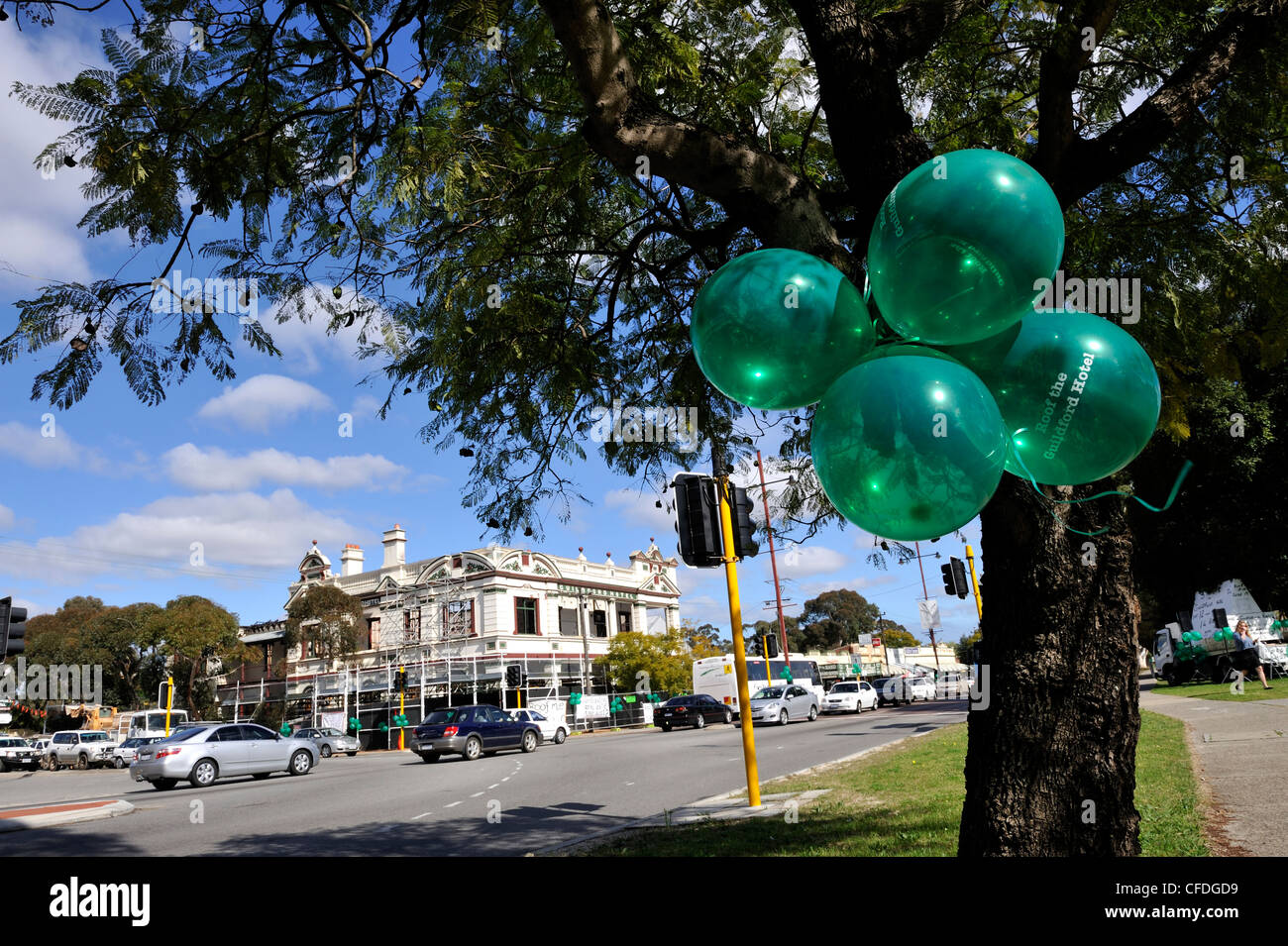 Balloons printed with 'Roof The Guildford Hotel', with the arson-damaged Guildford Hotel in background. Western Australia Stock Photo