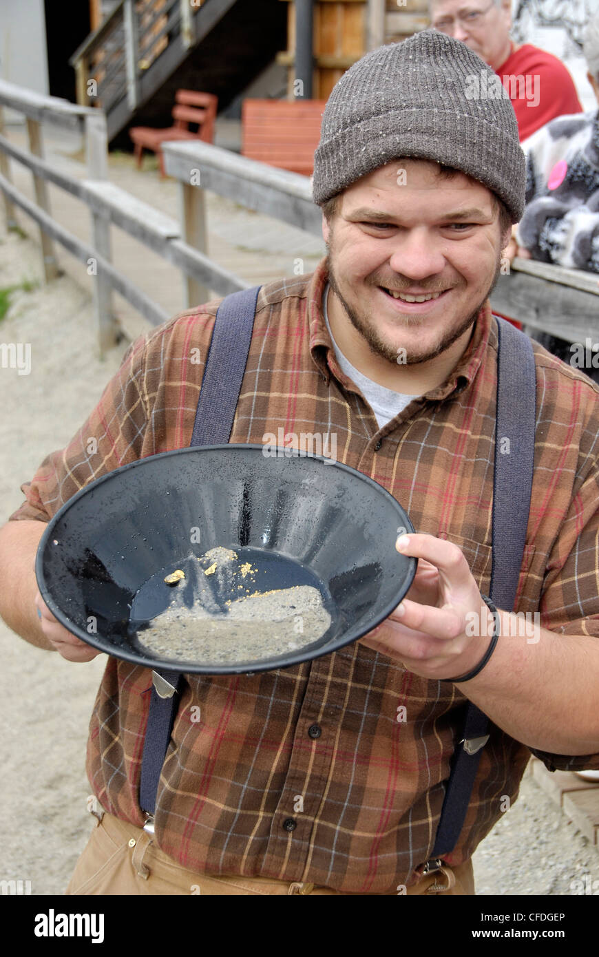 Miner demonstrating the art of gold panning at the Klondike Gold Fields