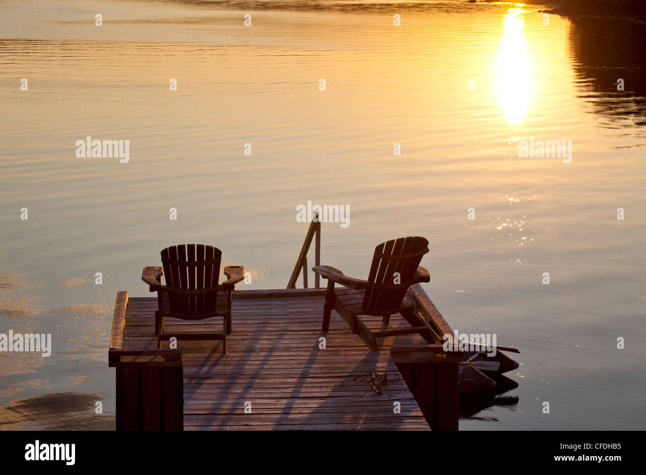 Lawn chairs on wharf, LaHave River, Nova Scotia, Canada Stock Photo Alamy