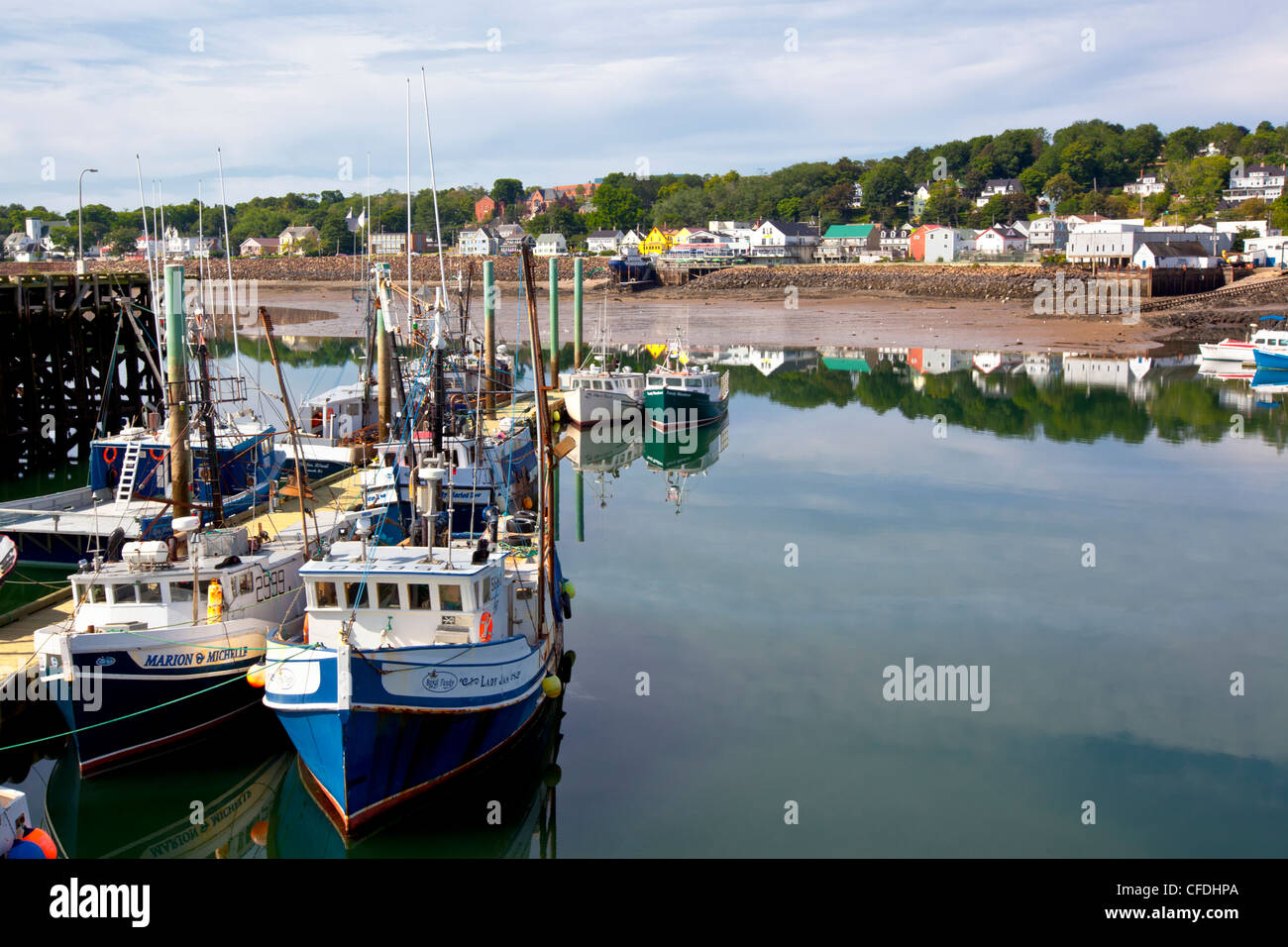 Fishing boats tied up at wharf, Digby, Bay of Fundy, Nova Scotia, Canada Stock Photo