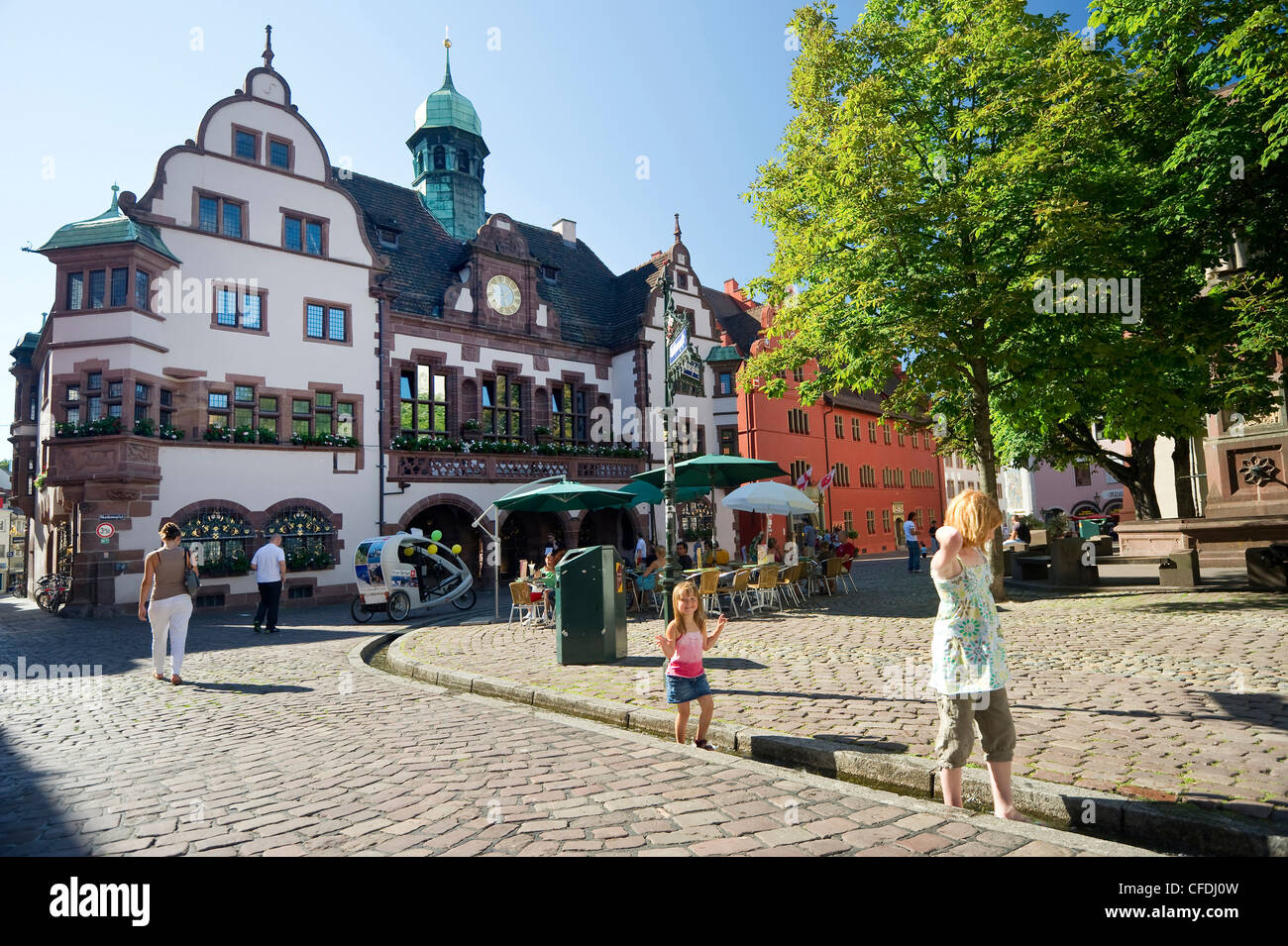 Town hall square with new and old town hall, old town, Freiburg im Breisgau, Baden-Wurttemberg, Germany Stock Photo