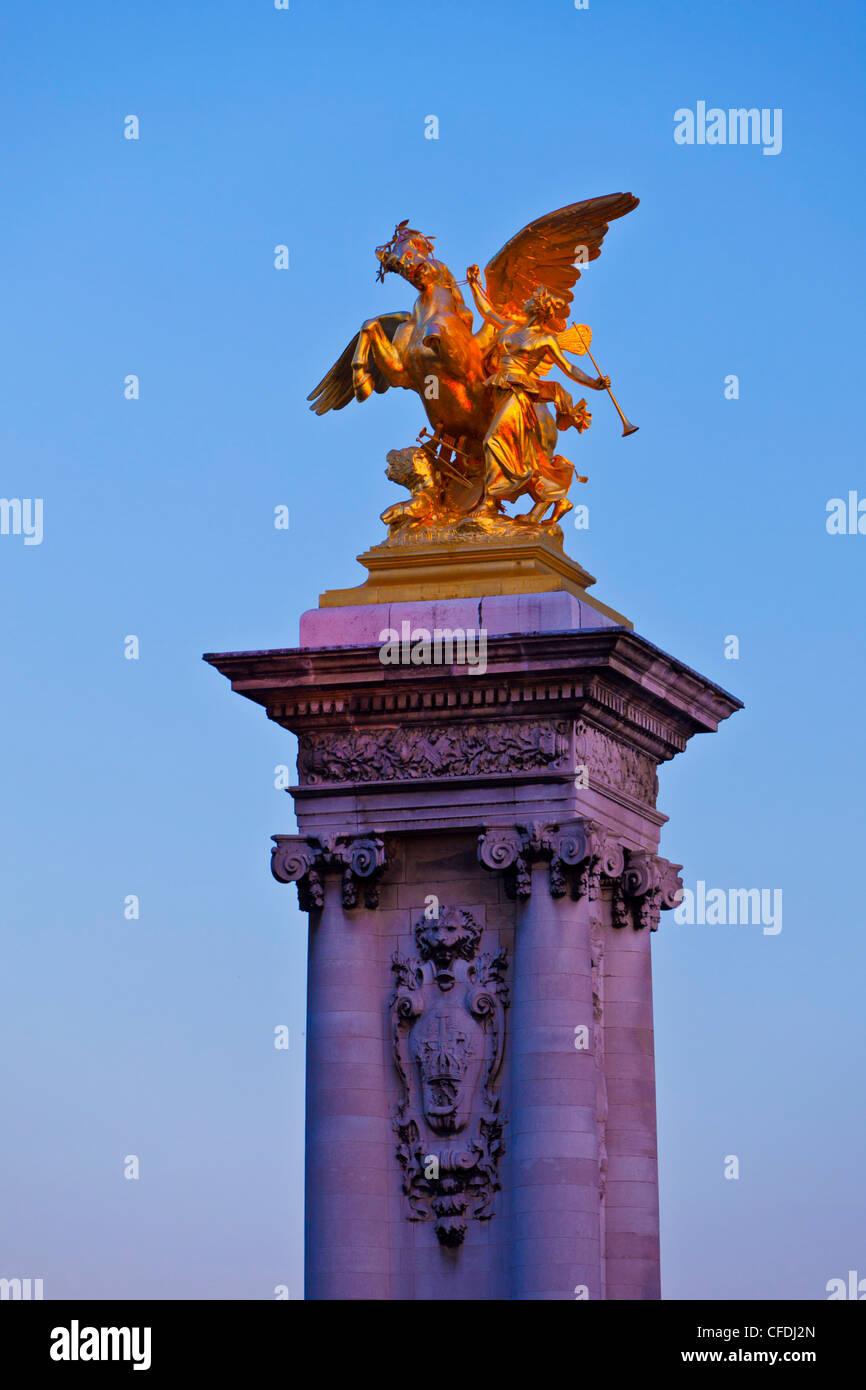 Gilded sculpture of Fame restraining Pegasus, Alexandre III Bridge, Paris, France, Europe Stock Photo