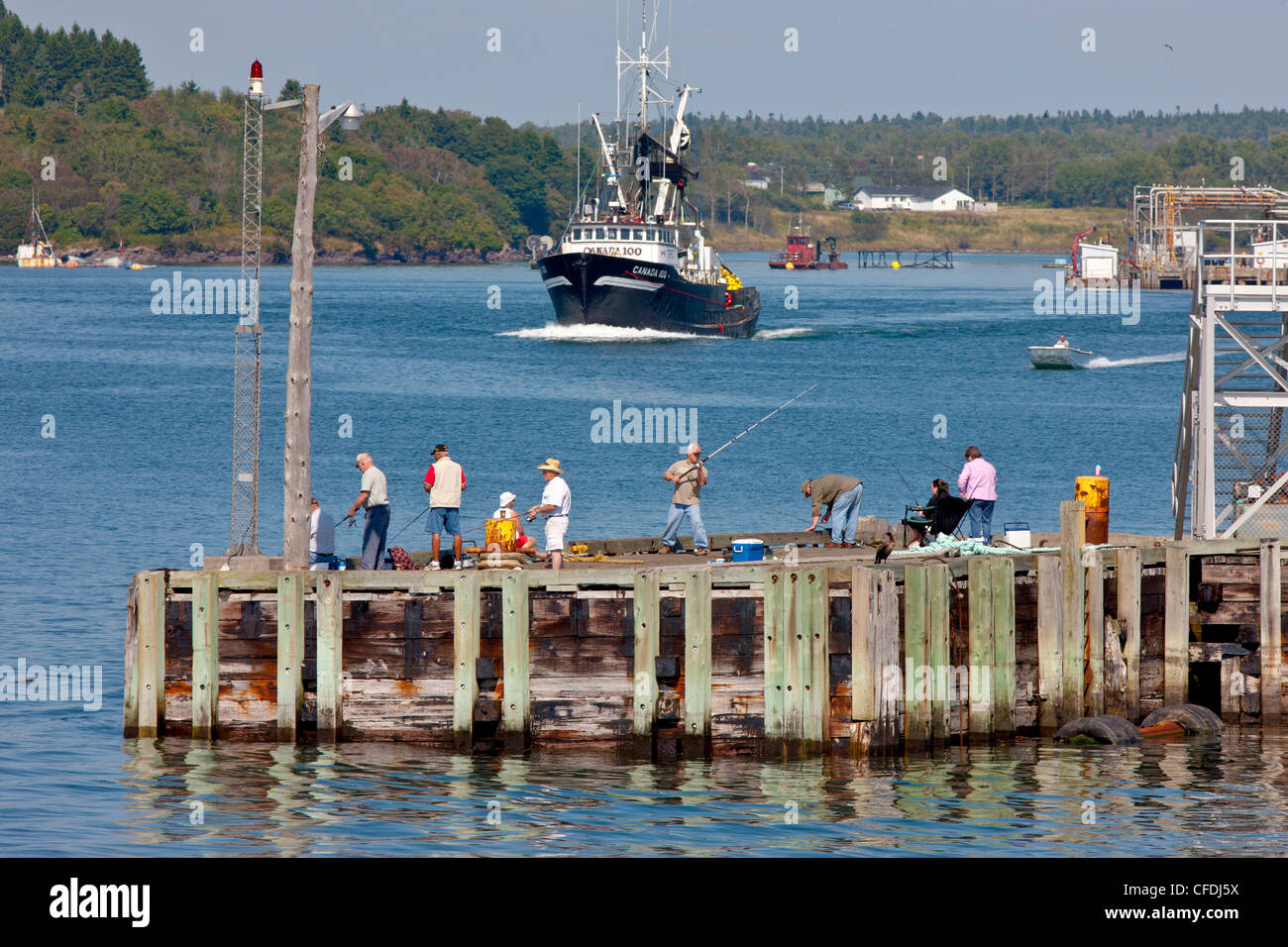 People fishing for Mackerel while fishing boat leaves Blacks Harbour