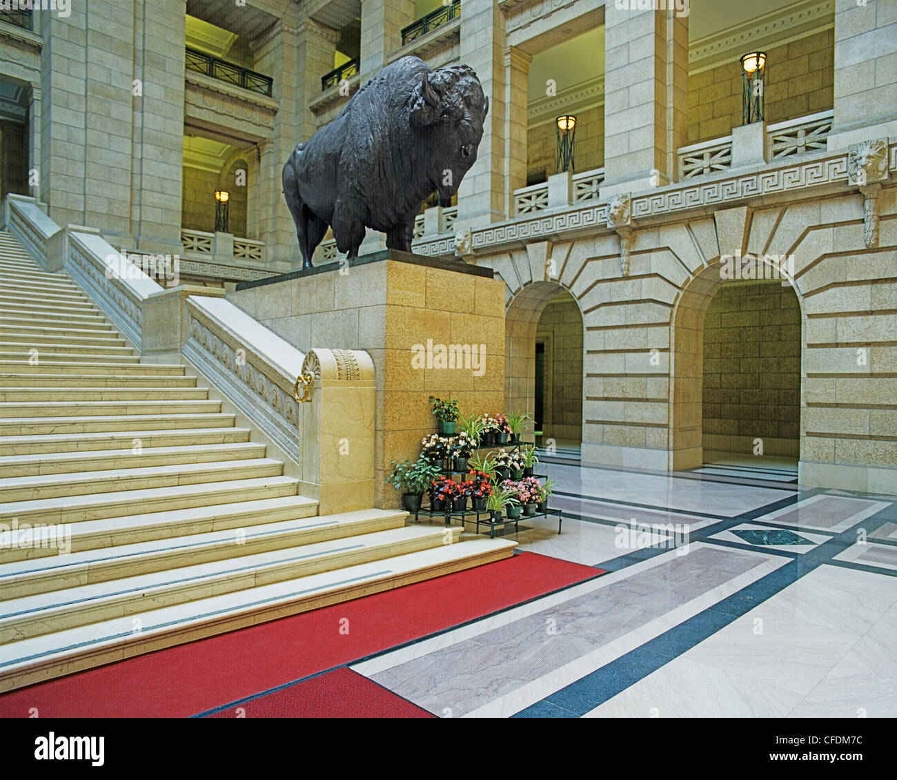 Noth American Bison statue and the Grand Staircase, Manitoba Legislative Building, Winnipeg, Manitoba, Canada Stock Photo