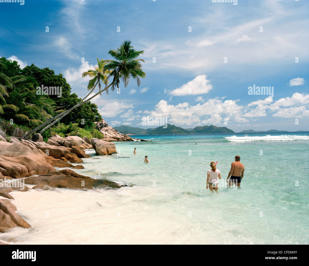 Snorkelers at Anse Severe Beach, north western La Digue, La Digue and Inner Islands, Republic of Seychelles, Indian Ocean Stock Photo
