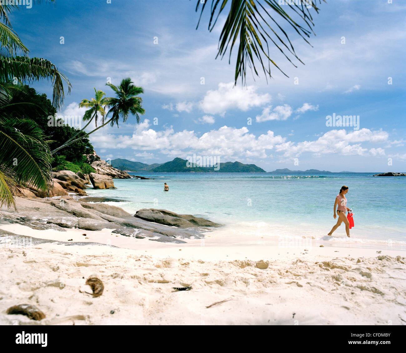 People at Anse Severe Beach, north western La Digue, La Digue and Inner ...