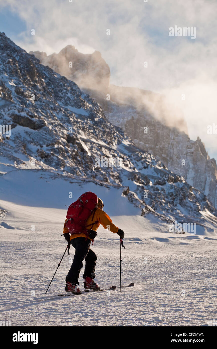 A man ski tours along the French/Haig Robertson Traverse, Peter Lougheed Provinicial Park, Kananaskis, Alberta, Canada Stock Photo