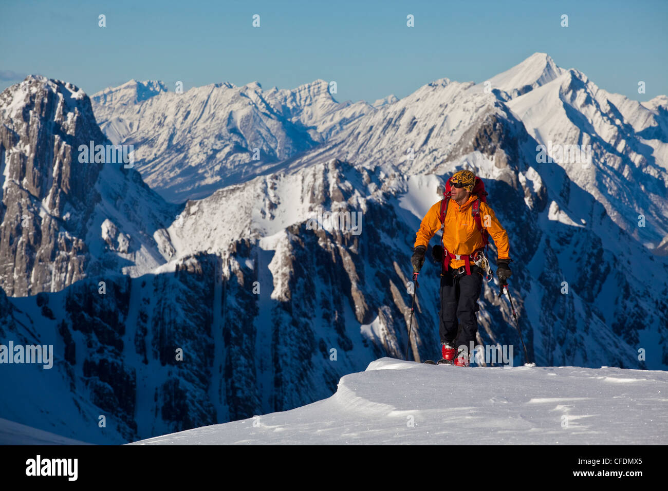 A man ski tours along the French/Haig Robertson Traverse, Peter Lougheed Provinicial Park, Kananaskis, Alberta, Canada Stock Photo