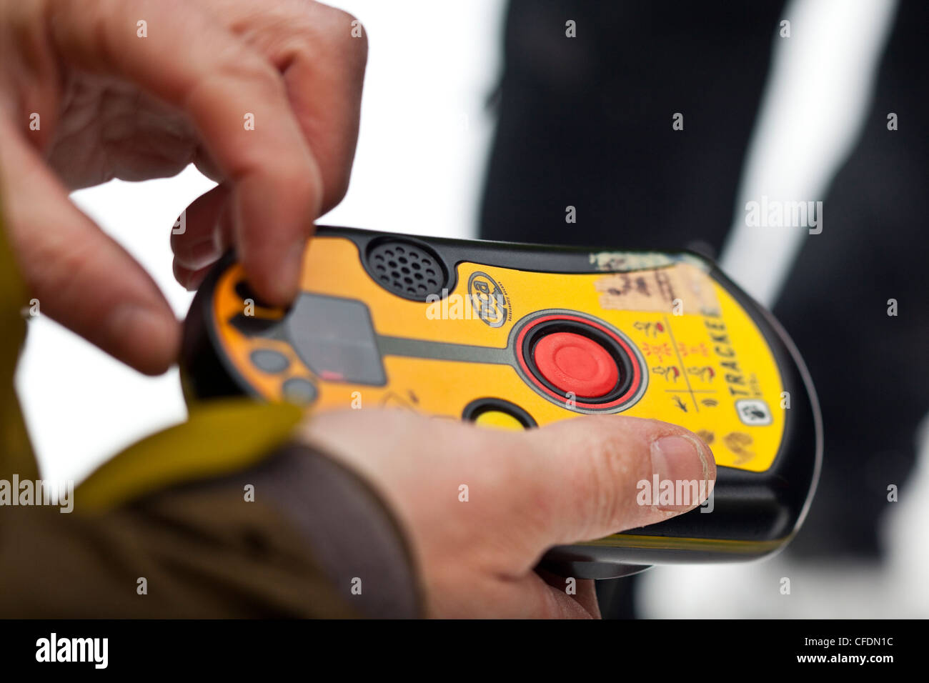 Testing an avalanche beacon before heading into the backcountry