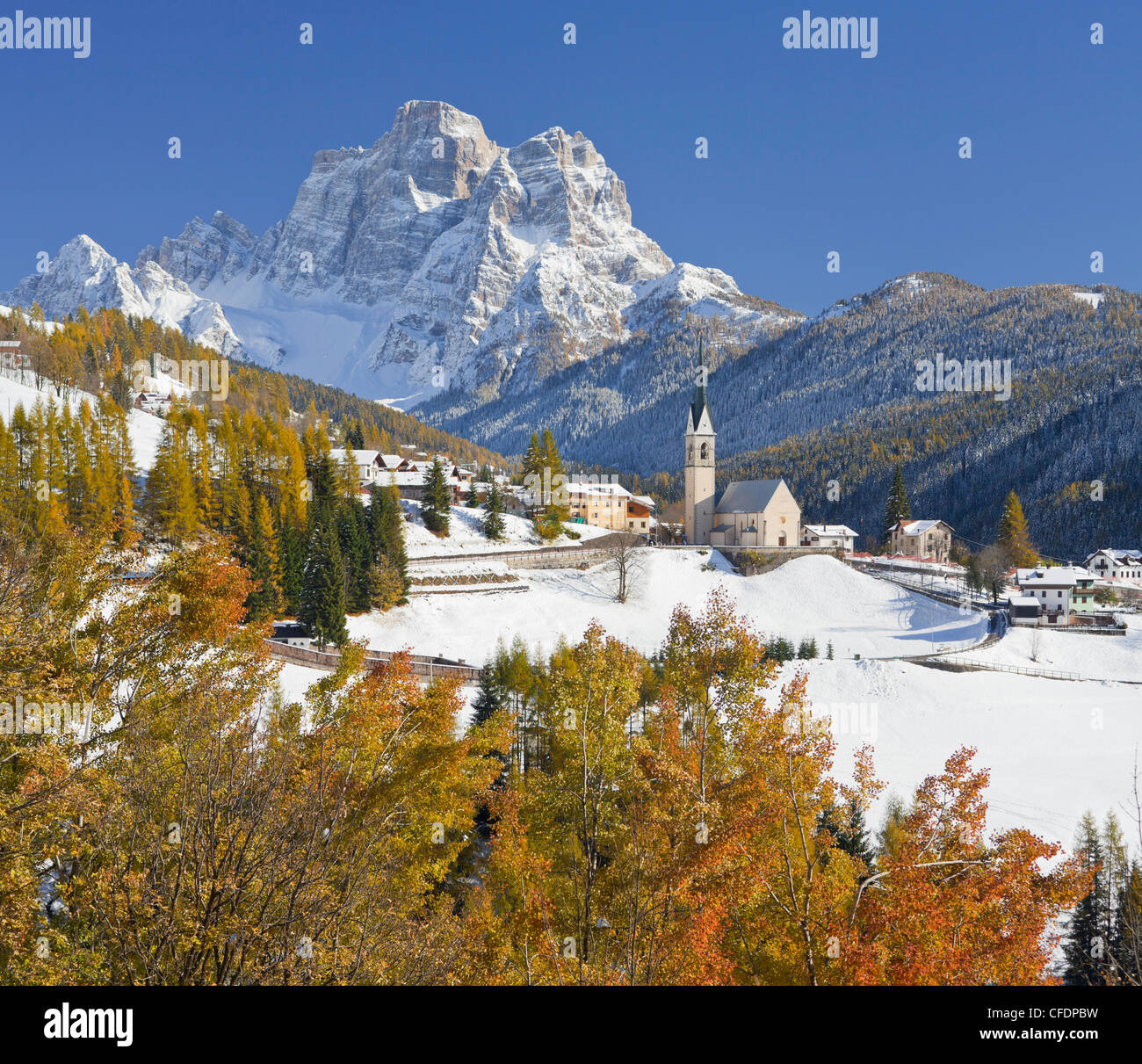 The snow covered mountain village Selva di Cadore in front of Monte Pelmo mountain, Dolomites, Veneto, Italy, Europe Stock Photo