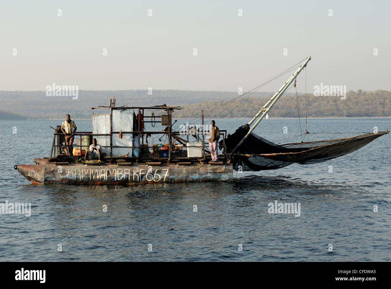 Kapenta fishing boat and crew, early morning, Lake Kariba, Zimbabwe, Africa Stock Photo