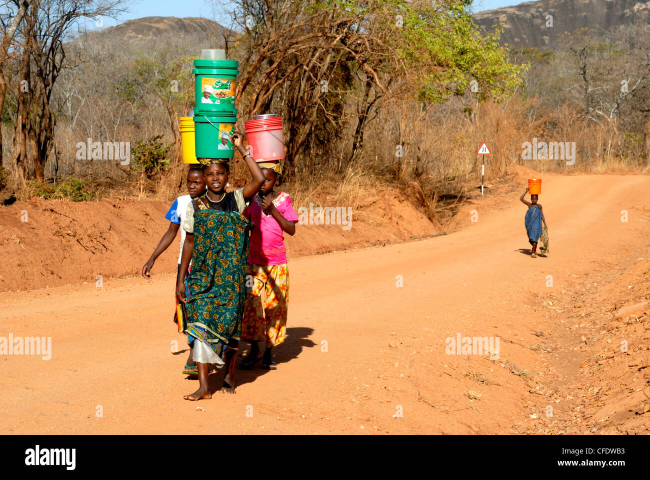 Women carrying water africa hi-res stock photography and images - Alamy